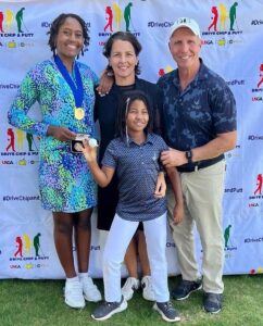 student at golf tournament